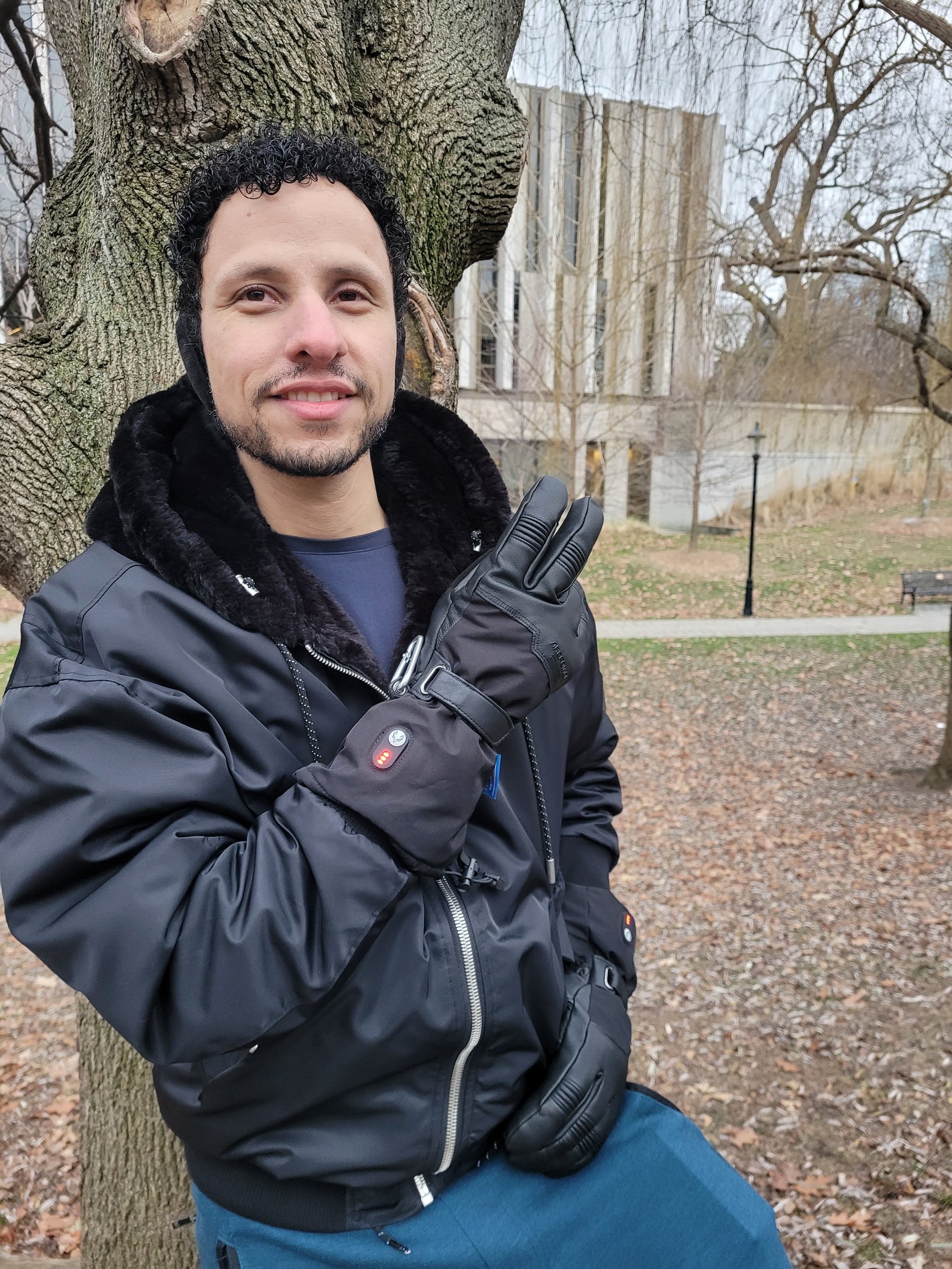 A man who loves the outdoors wears Ottawa Nights gloves
