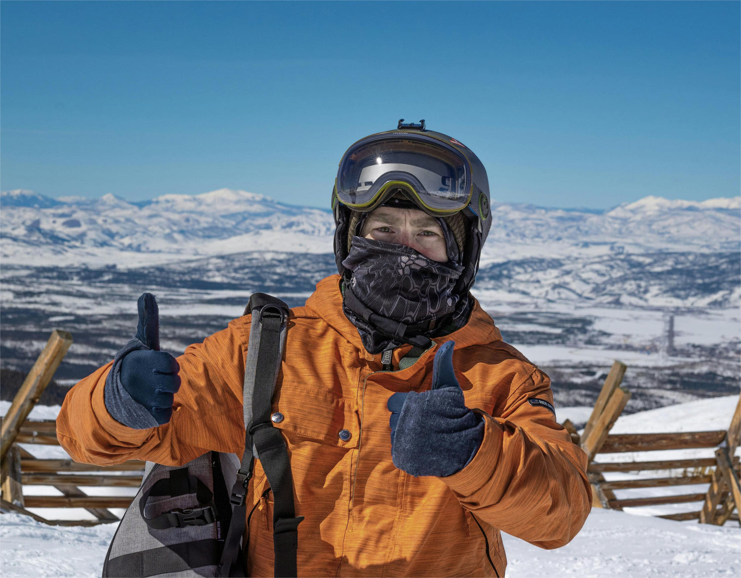 A beautiful woman skiing outdoors wearing Arcfomor's Spider silk heated gloves