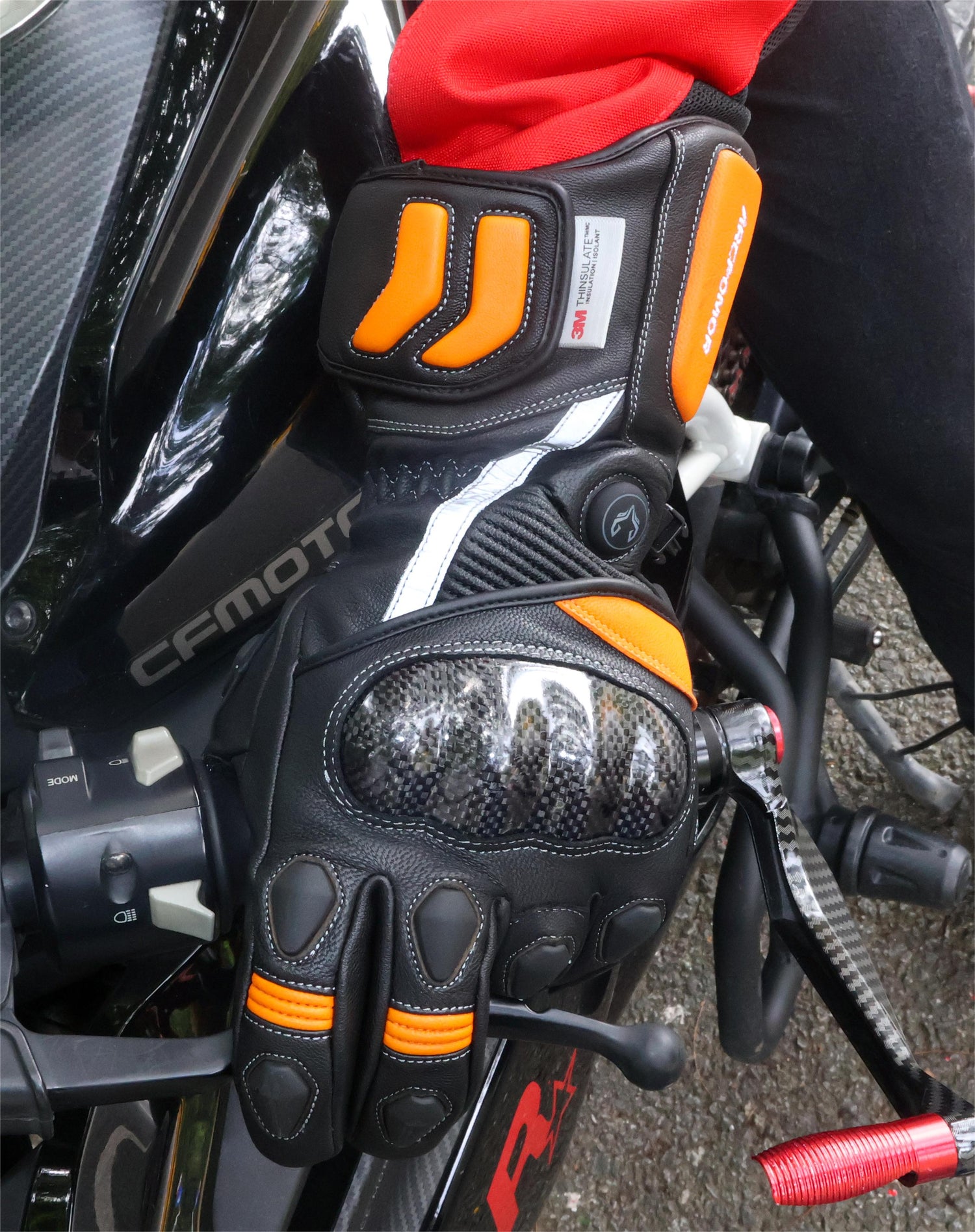 This image shows a motorcyclist wearing ArcFomor Heated Motorcycle Gloves, offering warmth and flexibility in cold conditions. With advanced heating technology and durable design, ArcFomor gloves stand out for providing comfort and reliability on the road.